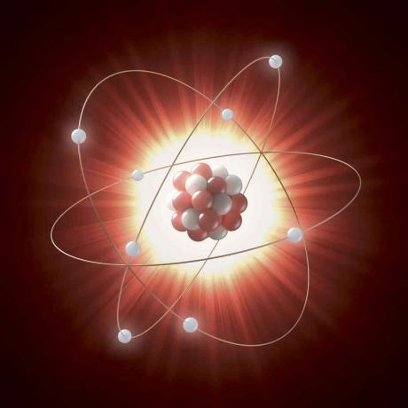 Илустрација атомског језгра као низа црвених и белих кругова, окружени с електронима представљеним белим круговима.